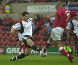 Steve Robinson wins his tackle