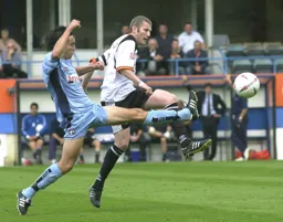Kevin Nicholls shoots for goal