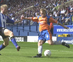 Paul Underwood gets in a cross