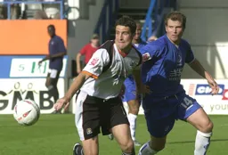 Chris Coyne clears the danger