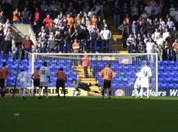 Dino Seremet saves a penalty but the rebound is tapped in