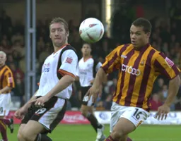 Steve Howard battles with future Hatter Lewis Emanuel