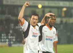 Steve Howard and Calvin Andrew at the end of the game