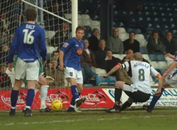 Kevin Nicholls slides in