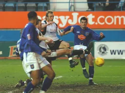Steve Howard pokes in the Town's second goal