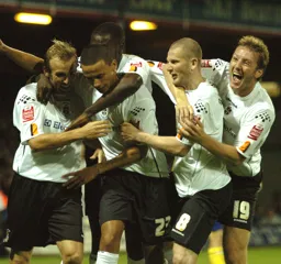 Team celebrate Dean Morgan's goal. Kevin Nicholls Steven Howard Paul Underwood Enoch Showunmi