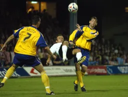 Ahmet Brkovic's overhead kick watched by two Southampton players