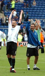 Kevin Nicholls and Ahmet Brkovic celebrate on the pitch after the game