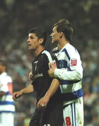 Stephen Robinson marked by a QPR player