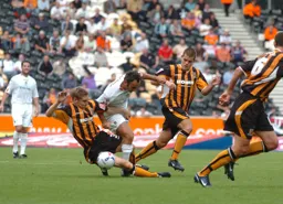 Ahmet Brkovic slide tackled by a Hull player