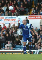 Enoch Showunmi wins the header