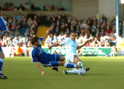 Dean Morgan goes in for a sliding tackle