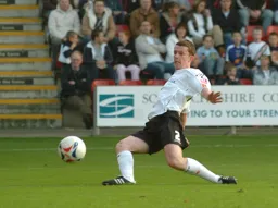 Kevin Foley stretches for the ball
