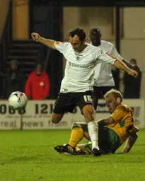 Ahmet Brkovic evades a tackle