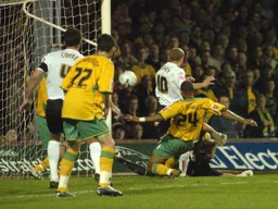 Warren Feeney scores