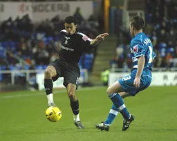 Carlos Edwards brings the ball under control