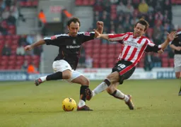 Ahmet Brkovic coolly evades a challenge from a Southampton player