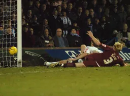 Steven Howard slides in to score