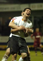 Stephen Robinson celebrates his goal