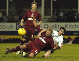 Stephen Robinson goes in hard