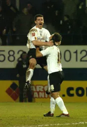 Stephen Robinson celebrates his goal with Ahmet Brkovic