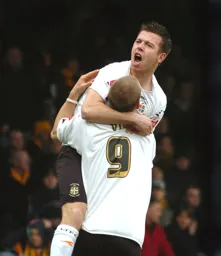Keith Keane celebrates his goal with Steven Howard