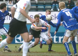 Steven Howard heads the goal in a crowded penalty box