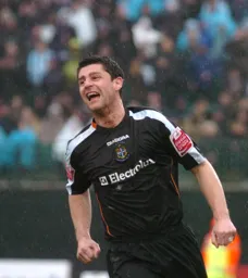 Stephen Robinson celebrates his goal