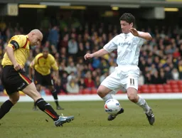 Stephen Robinson blocks a shot from a Watford player