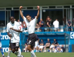 Carlos Edwards celebrates scoring the second goal