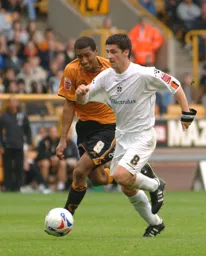 Steve Robinson holds off Karl Henry