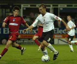 Sol Davis tries to find a way past Kemel Izzet