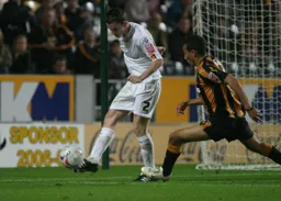 Kevin Foley clears the ball