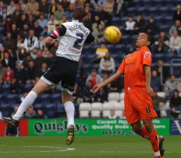 The ball has beaten former Hatter Graham Alexander as Dean Morgan prepares to control the ball