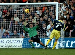 Maron Beresford saves a point blank effort by Morten Bisgaard