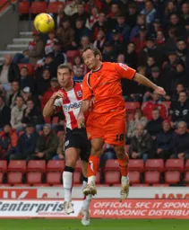 Ahmet Brkovic wins a header