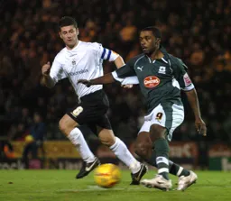 Steve Robinson keeps a watchful eye on Sylvan Ebanks-Blake