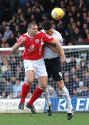 Chris Coyne appears to get a forearm in his face for his troubles
