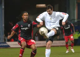 Adam Boyd comes under pressure from Michael Mancienne