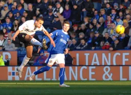 Dean Morgan hammers a shot from long range