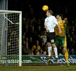 Drew Talbot heads in Town`s second goal