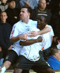 Leon Barnett celebrates his goal with Keith Keane