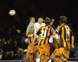 Drew Talbot gets his head to the ball to score Town`s only goal