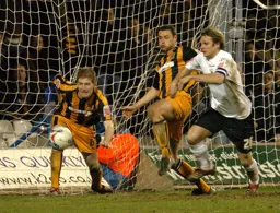 Markus Heikkinen cannot quite turn the ball into the net