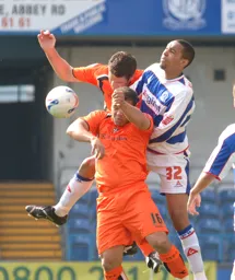 Chris Coyne and Lewis Emanuel combine to keep Dexter Blackstock at bay