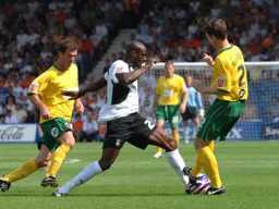 Paul Furlong tries to evade the on coming tackle