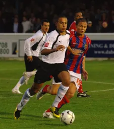 Dean Morgan with the ball