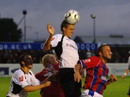 Dave Edwards comfortably wins the header