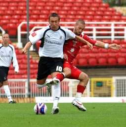 Darren Currie evades a challenge