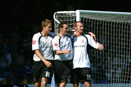 David Bell celebrates his goal with Dave Edwards and Drew Talbot